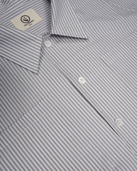 THE 9 TO 5 BUTTON-UP